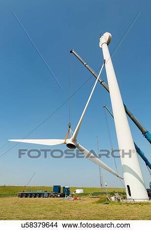 Low angle view of wind turbine being dismantled View Large Photo Image Picture - Low angle view of wind turbine being dismantled. Fotosearch