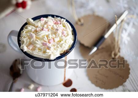 Picture - Marshmallow in hot chocolate. Fotosearch