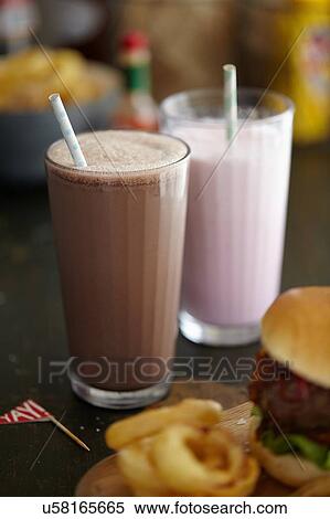 "Milkshakes, burger and onion rings" View Large Photo Image Stock Photography - "Milkshakes, burger and onion rings". Fotosearch