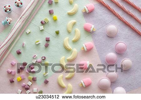 Multi-shaped coloured candies View Large Photo Image Stock Image - Multi-shaped coloured candies. Fotosearch