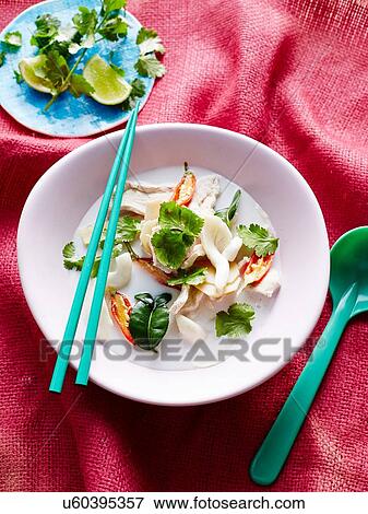 Overhead view of coconut milk hero tom kha in bowl with chopsticks and soup spoon View Large Photo Image Stock Photo - Overhead view of coconut milk hero tom kha in bowl with chopsticks and soup spoon. Fotosearch