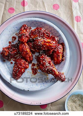 Overhead view of gochuchang hero covered chicken View Large Photo Image Picture - Overhead view of gochuchang hero covered chicken. Fotosearch