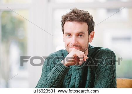 Stock Image - Portrait of a mid adult man. Fotosearch