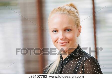 Portrait of a young woman View Large Photo Image Stock Image - Portrait of a young woman. Fotosearch