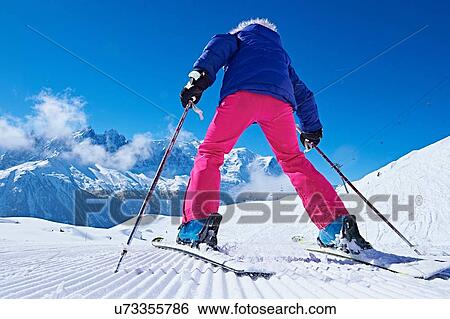 Stock Photograph - "Rear view of skier, Chamonix, France". Fotosearch