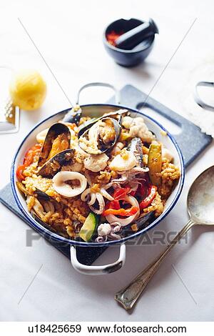 Stock Photo - "Seafood paella, close-up". Fotosearch