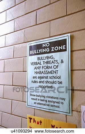 Picture - "Sign posted on campus of primary school in Atlanta, Georgia, to make students aware that bullying behavior would not be tolerated". Fotosearch