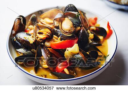 "South indian seafood curry, close-up" View Large Photo Image Stock Photo - "South indian seafood curry, close-up". Fotosearch