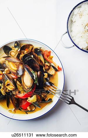 "South indian seafood curry, overhead view" View Large Photo Image Stock Image - "South indian seafood curry, overhead view". Fotosearch