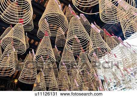 "Spiral incense cones hanging in Thien Hau Temple, Ho Chi Minh city, Vietnam" View Large Photo Image Stock Image - "Spiral incense cones hanging in Thien Hau Temple, Ho Chi Minh city, Vietnam". Fotosearch
