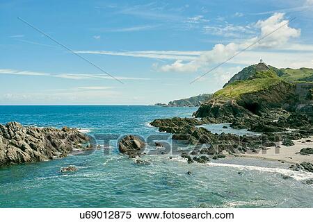Stock Photography - "St Nicholas chapel in distance, Ilfracombe, North Devon, England". Fotosearch