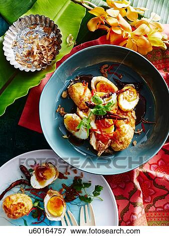 Still life of bowl of 'son in law eggs' with boiled eggs and garnish View Large Photo Image Stock Photo - Still life of bowl of 'son in law eggs' with boiled eggs and garnish. Fotosearch