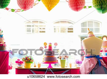 Picture - "Still life of cake shop window display, taken from inside shop". Fotosearch