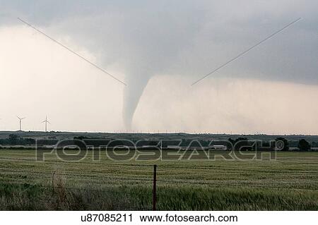Tornado over the plains in Kansas. NOAA's National Severe Storms Laboratory (NSSL) Collection. Photo Date: 2008 May 23 View Large Photo Image Stock Image - Tornado over the plains in Kansas. NOAA's National Severe Storms Laboratory (NSSL) Collection. Photo Date: 2008 May 23. Fotosearch