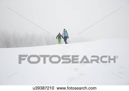 "Women enjoying snow, Sattelbergalm, Tirol, Austria" View Large Photo Image Stock Image - "Women enjoying snow, Sattelbergalm, Tirol, Austria". Fotosearch