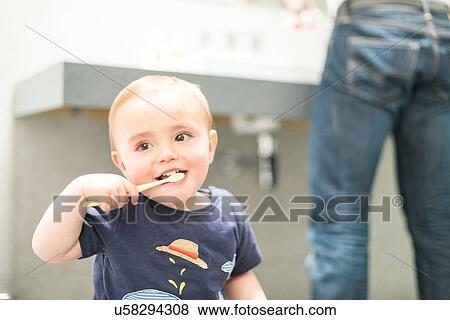 Young boy brushing teeth View Large Photo Image Stock Photo - Young boy brushing teeth. Fotosearch