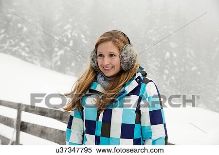 "Young woman posing in snow, Sattelbergalm, Tirol, Austria" View Large Photo Image Stock Photography - "Young woman posing in snow, Sattelbergalm, Tirol, Austria". Fotosearch