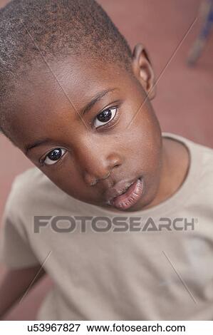 African boy doing funny face View Large Photo Image Stock Photo - African boy doing funny face. Fotosearch