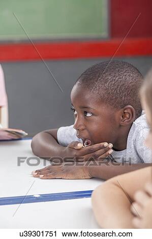 Stock Image - African boy laughing. Fotosearch