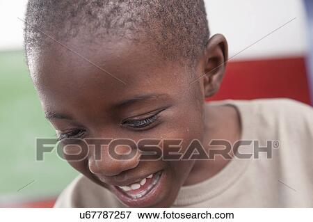 African boy smiling View Large Photo Image Stock Photo - African boy smiling. Fotosearch