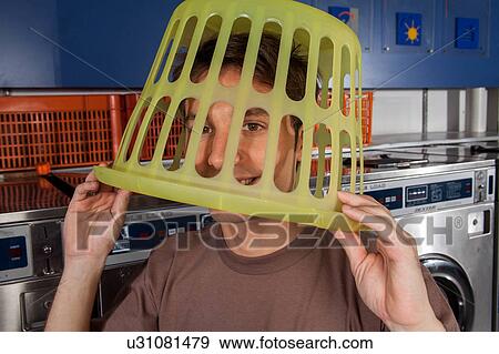 Stock Photo - Basket on his head. Fotosearch