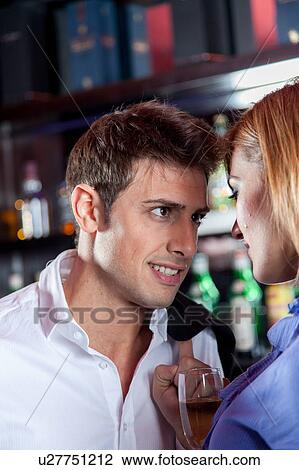 Beautiful man holding a wineglass View Large Photo Image Stock Image - Beautiful man holding a wineglass. Fotosearch