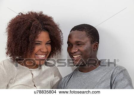 Black couple smiling View Large Photo Image Picture - Black couple smiling. Fotosearch