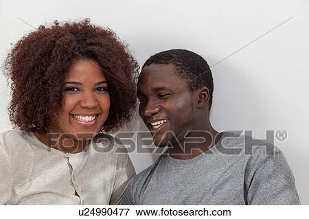 Black couple smiling View Large Photo Image Stock Photo - Black couple smiling. Fotosearch