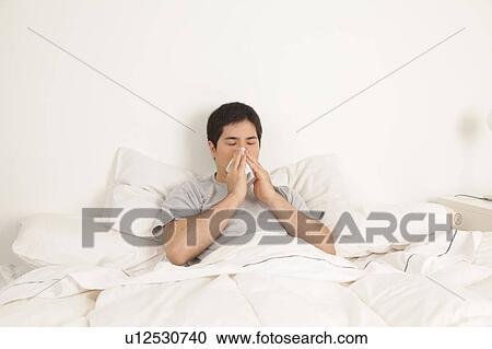 blowing his nose View Large Photo Image Stock Image - blowing his nose . Fotosearch