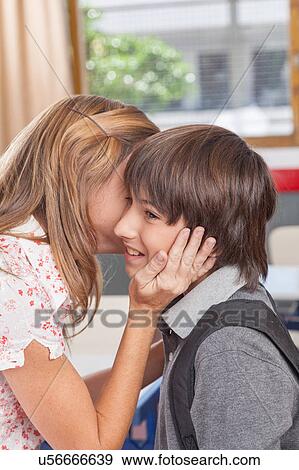 Stock Photo - Boy arriving at school. Fotosearch