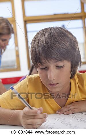 Picture - Boy doing an exercise. Fotosearch