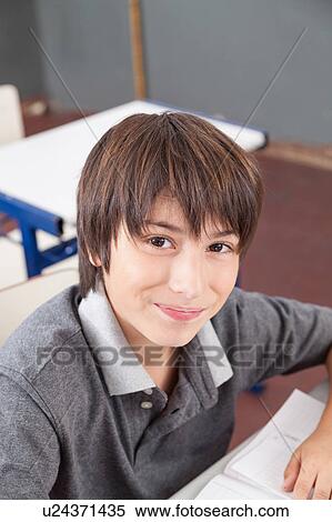 Stock Photography - boy in the classroom. Fotosearch