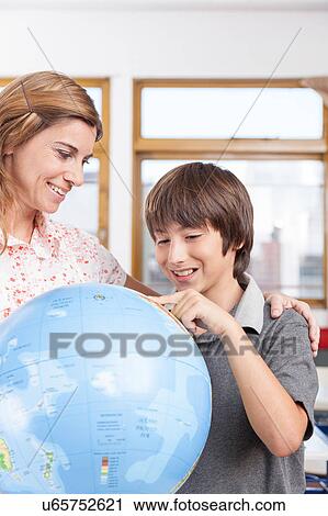 boy learning geography View Large Photo Image Stock Image - boy learning geography. Fotosearch