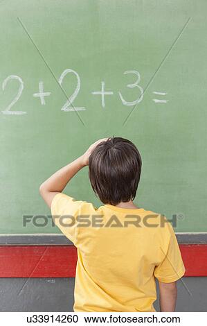 Boy worried about math View Large Photo Image Stock Image - Boy worried about math. Fotosearch