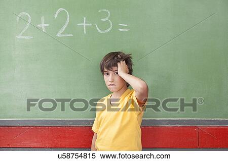 Stock Photography - Boy worried about math. Fotosearch