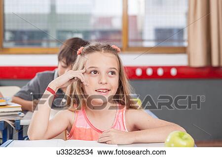 Picture - concentrated girl. Fotosearch