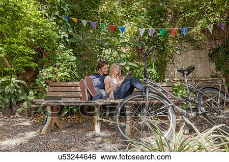 Stock Photograph - Couple enjoy the nature. Fotosearch