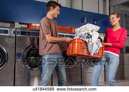 Couple fighting over clothes View Large Photo Image Stock Photo - Couple fighting over clothes. Fotosearch