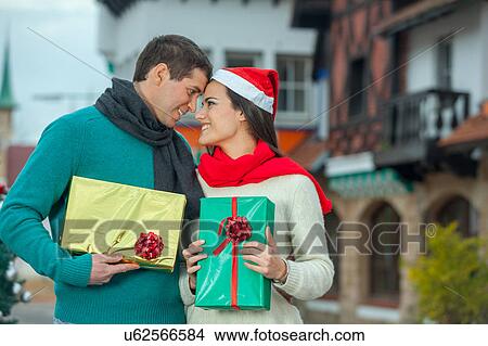 couple in christmas View Large Photo Image Picture - couple in christmas. Fotosearch