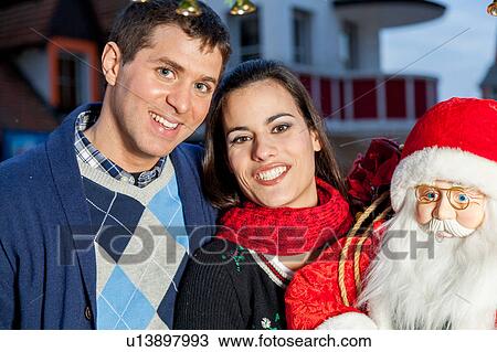 Stock Image - couple in christmas. Fotosearch