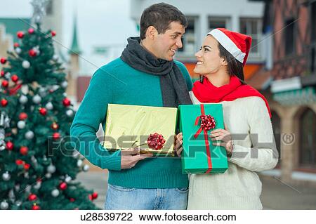 Stock Image - couple in christmas. Fotosearch