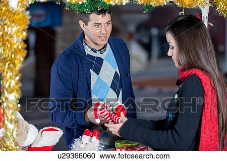 couple in christmas View Large Photo Image Stock Image - couple in christmas. Fotosearch