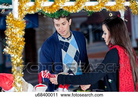 couple in christmas View Large Photo Image Stock Image - couple in christmas. Fotosearch