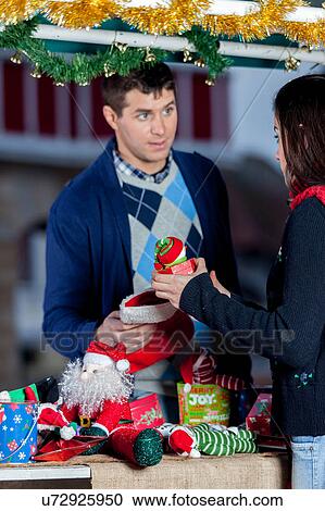 Stock Image - couple in christmas. Fotosearch