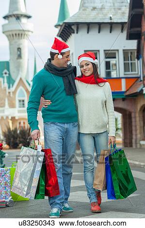 Stock Image - couple in christmas. Fotosearch