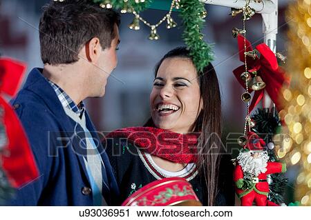 couple in christmas View Large Photo Image Stock Image - couple in christmas. Fotosearch