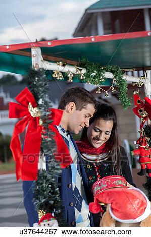 couple in christmas View Large Photo Image Stock Photo - couple in christmas. Fotosearch
