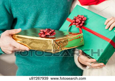 Couple in christmas View Large Photo Image Stock Photo - Couple in christmas. Fotosearch