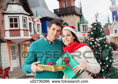 Stock Photograph - couple in christmas. Fotosearch