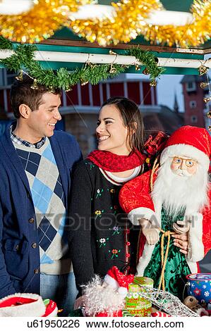couple in christmas View Large Photo Image Stock Photograph - couple in christmas. Fotosearch